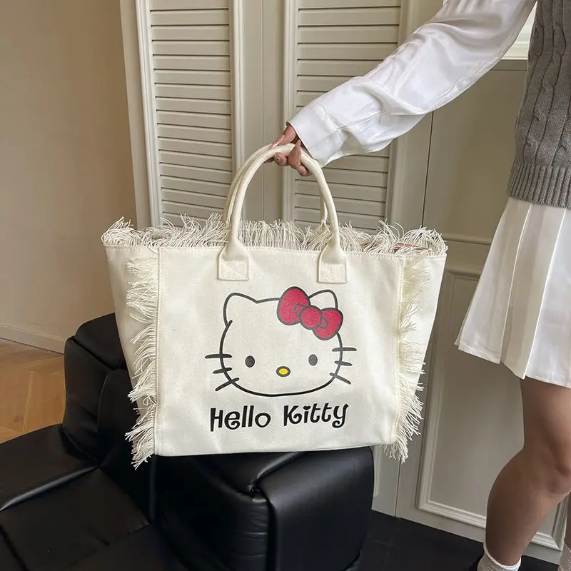 Холщовая сумка Hello Kitty, новая портативная модная сумка на одно плечо, большая вместительная сумка для студентов, простая для женщин и девочек 
Холщовая сумка Hello Kitty, новая портативная модная сумка на одно плечо, большая вместительная сумка для студентов, простая для женщин и девочек
