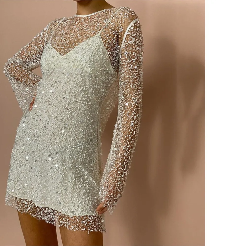 Элегантный костюм с блестками, модное сетчатое сексуальное мини-платье из двух предметов, женское вечернее платье для ночного клуба, Conjuntos Femininos
Элегантный костюм с блестками, модное сетчатое сексуальное мини-платье из двух предметов, женское вечернее платье для ночного клуба, Conjuntos Femininos