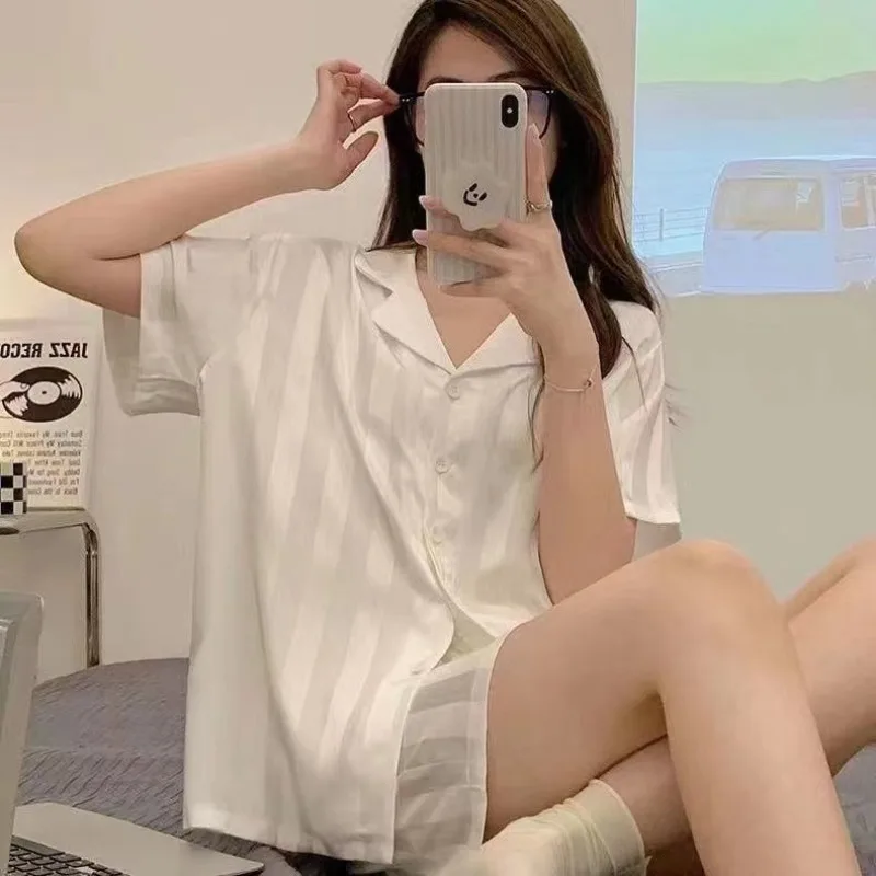 Plaid Couple Pajamas Men's Women's Summer Ice Silk Short Sleeves Outerwear 2023 Simulation Silk Plus Size Homewear Suit
Plaid Couple Pajamas Men's Women's Summer Ice Silk Short Sleeves Outerwear 2023 Simulation Silk Plus Size Homewear Suit