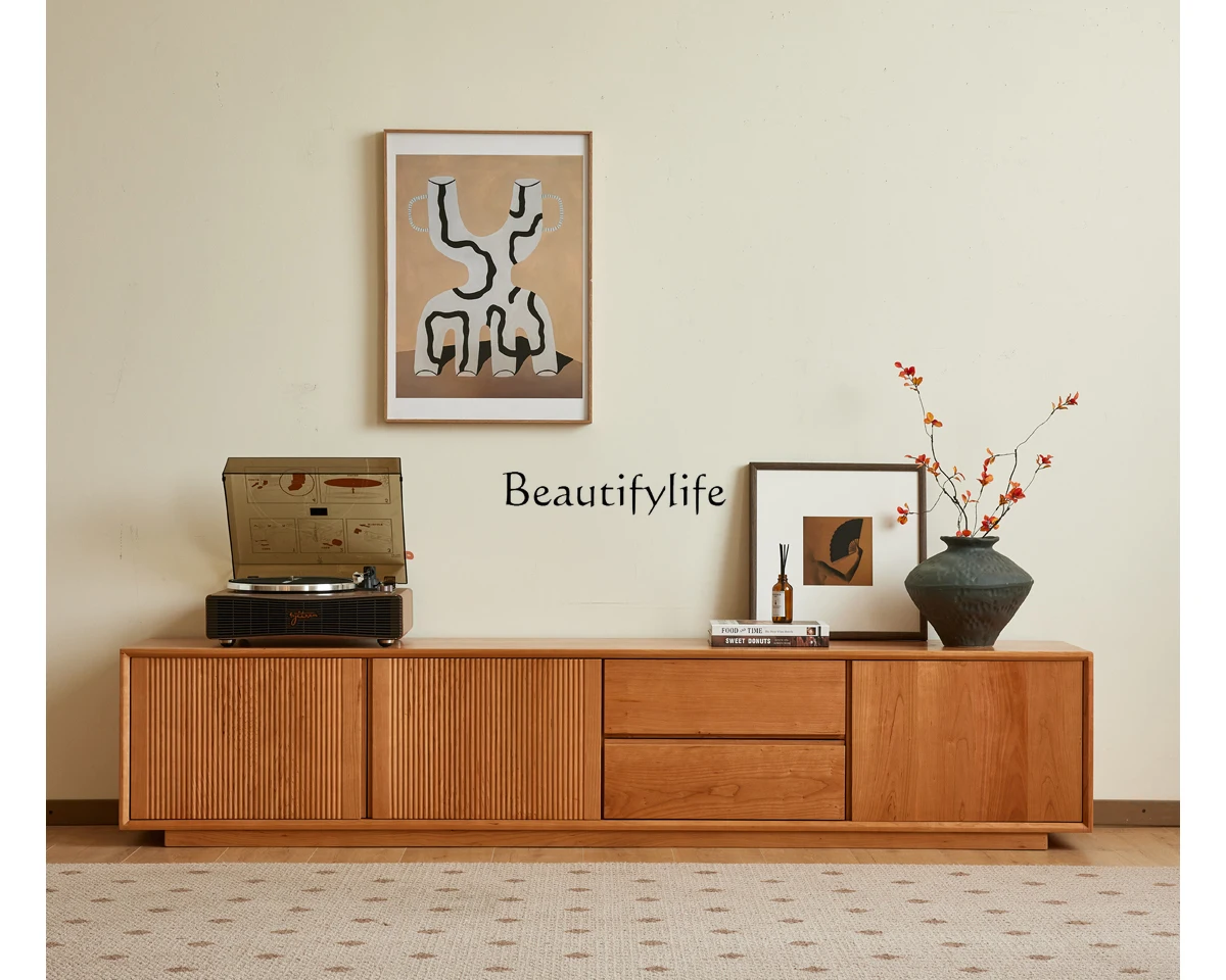Nordic solid wood TV cabinet Japanese minimalist cherry wood wabi sandy wind floor TV cabinet coffee table combination
Nordic solid wood TV cabinet Japanese minimalist cherry wood wabi sandy wind floor TV cabinet coffee table combination