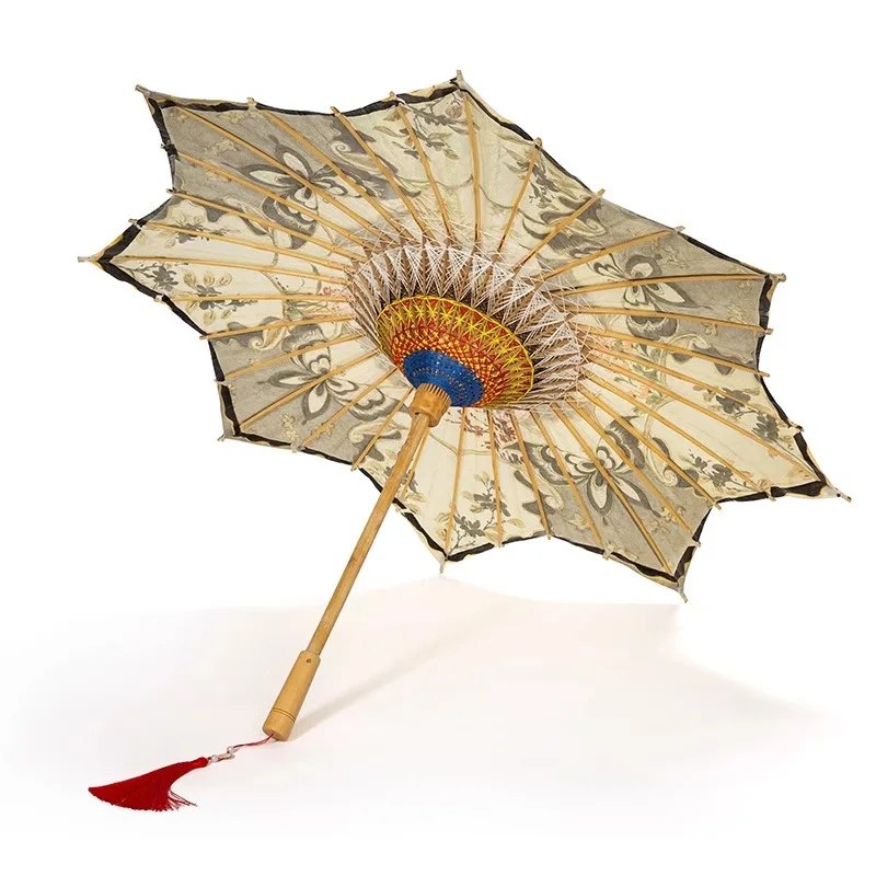 Octagonal oil-paper umbrella, ancient intangible cultural heritage special-shaped old-fashioned umbrella
Octagonal oil-paper umbrella, ancient intangible cultural heritage special-shaped old-fashioned umbrella