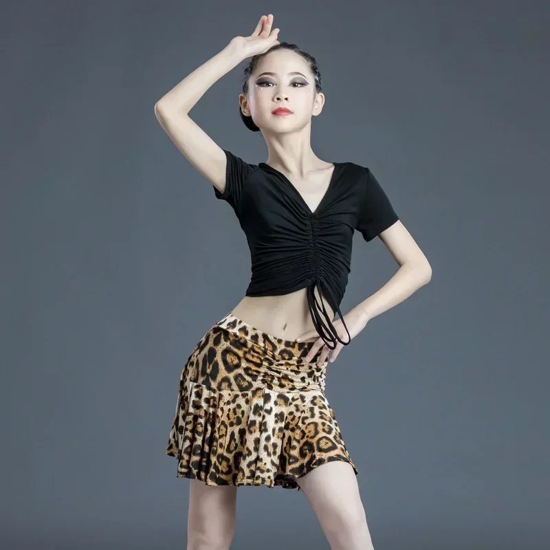 2026New Girls Latin Dance Costumes Children Ballroom Dancing Dress Kids Summer Black Short-sleeved Top And Leopard Print Skirt
2026New Girls Latin Dance Costumes Children Ballroom Dancing Dress Kids Summer Black Short-sleeved Top And Leopard Print Skirt