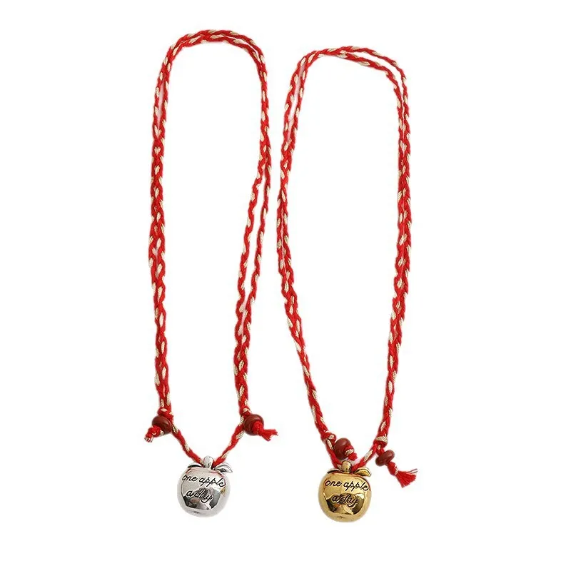 Red braided rope, gold apple pendant, necklace engraved to meet the bird stacked sweater chain
Red braided rope, gold apple pendant, necklace engraved to meet the bird stacked sweater chain