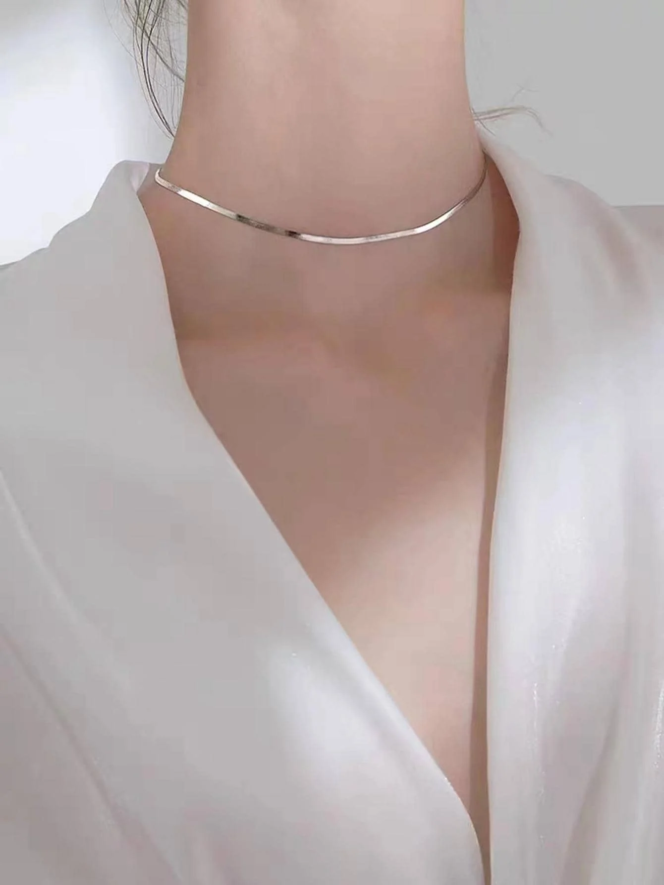 Elegant minimalist flat snake chain necklace perfect for parties holidays and daily styling
Elegant minimalist flat snake chain necklace perfect for parties holidays and daily styling