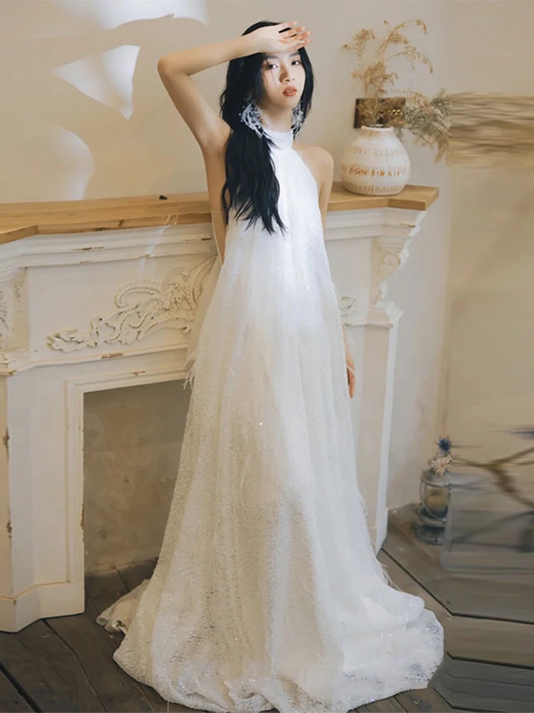 Elegant Lightweight Bridal Gown Sexy Backless Morning Robe for Bride White Fairy Tale Dress Neck Hanging Design out Door Gown
Elegant Lightweight Bridal Gown Sexy Backless Morning Robe for Bride White Fairy Tale Dress Neck Hanging Design out Door Gown