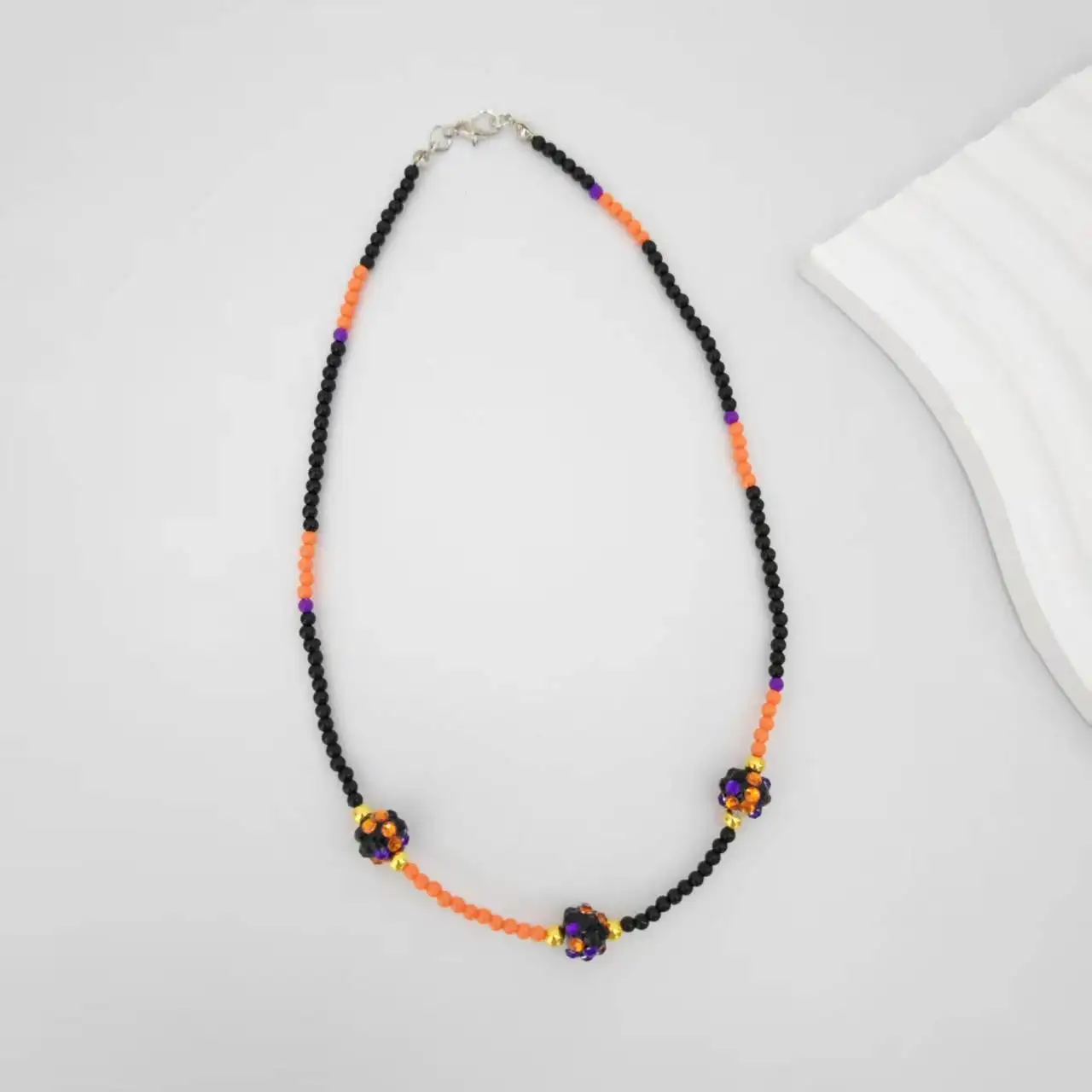 Orange Black Rice Bead Choker Necklace for Women Trendy Shiny Diamond Bead Handmade Halloween Necklace Jewelry Gift
Orange Black Rice Bead Choker Necklace for Women Trendy Shiny Diamond Bead Handmade Halloween Necklace Jewelry Gift