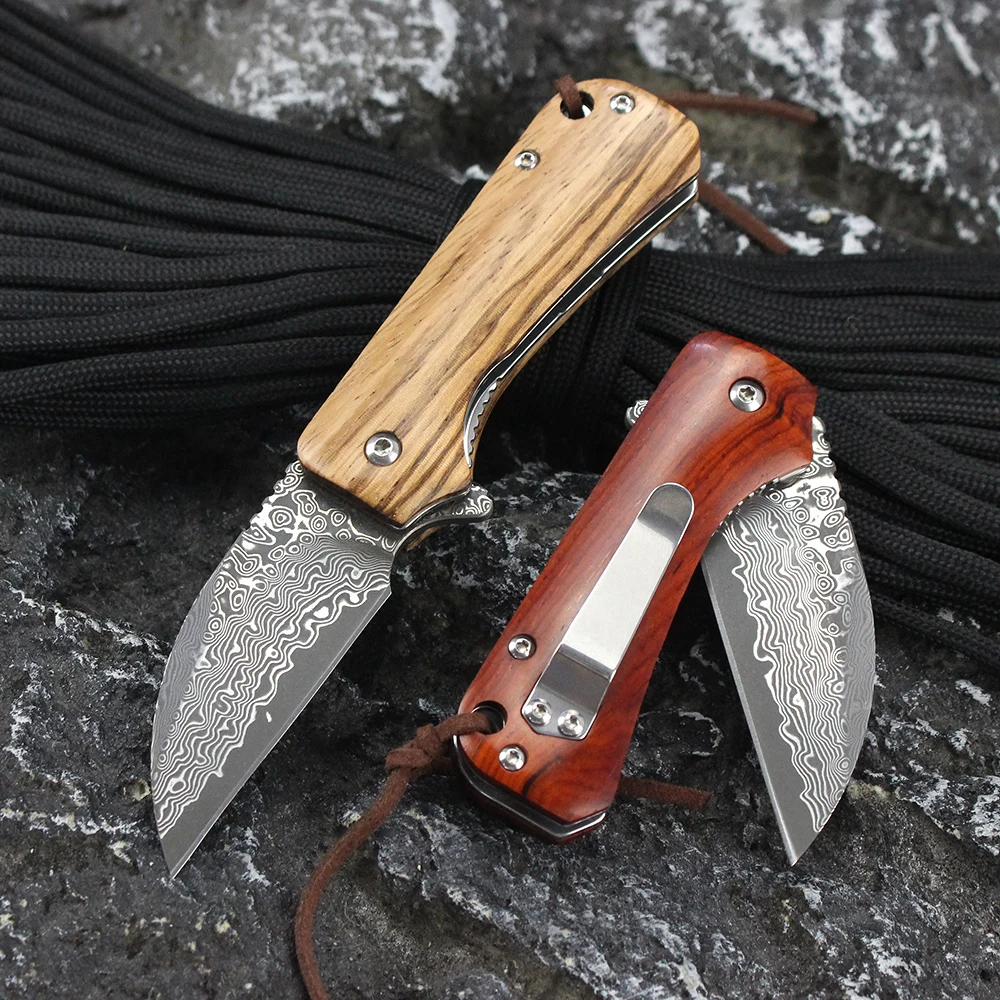 Складной нож GT-DM022 с клинком из дамасской стали и деревянной рукоятью, инструмент для EDC, кемпинга, походов, самообороны, легкий, с клипсой для крепления на карман.
Складной нож GT-DM022 с клинком из дамасской стали и деревянной рукоятью, инструмент для EDC, кемпинга, походов, самообороны, легкий, с клипсой для крепления на карман.