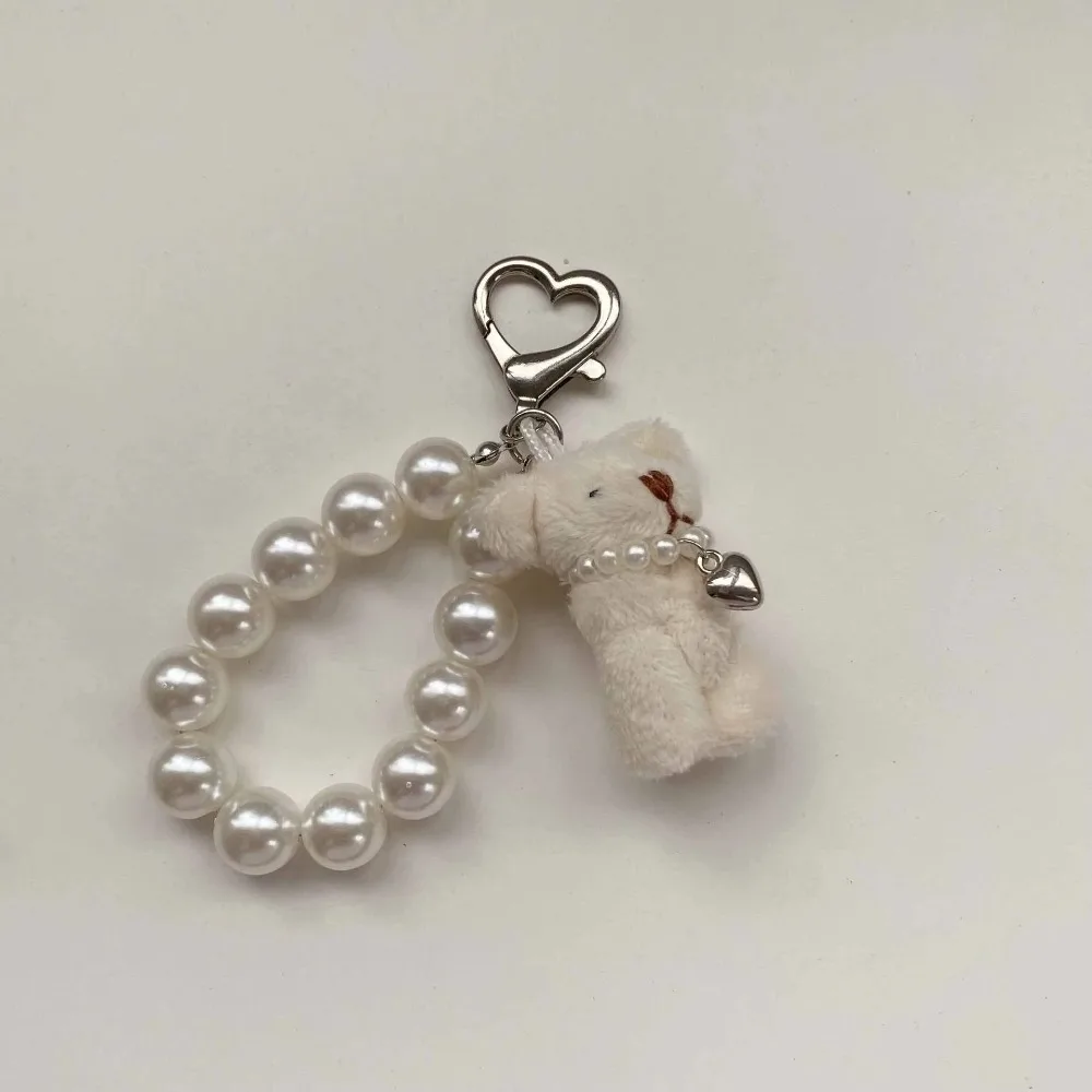 Cute Imitation Pearl Teddy Bear Mobile Phone Chain Gift Hanging Ornament Doll Pendant Handbag Pendant Keychain Women Girls
Cute Imitation Pearl Teddy Bear Mobile Phone Chain Gift Hanging Ornament Doll Pendant Handbag Pendant Keychain Women Girls