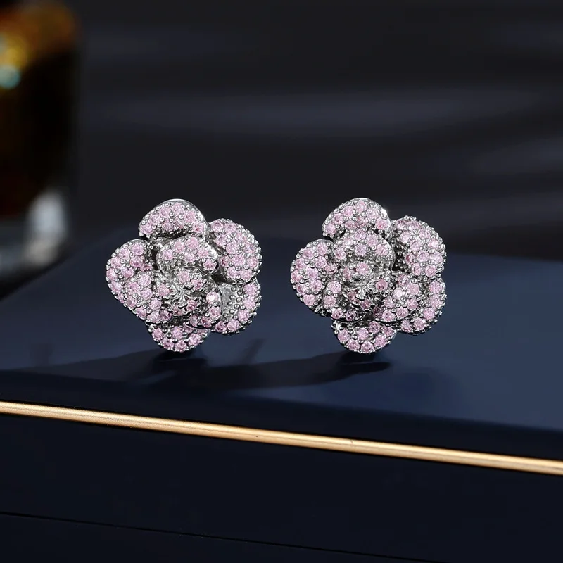 The niche design micro-inlaid zirconium flower earrings are fashionable, elegant and three-dimensional camellia ear studs
The niche design micro-inlaid zirconium flower earrings are fashionable, elegant and three-dimensional camellia ear studs