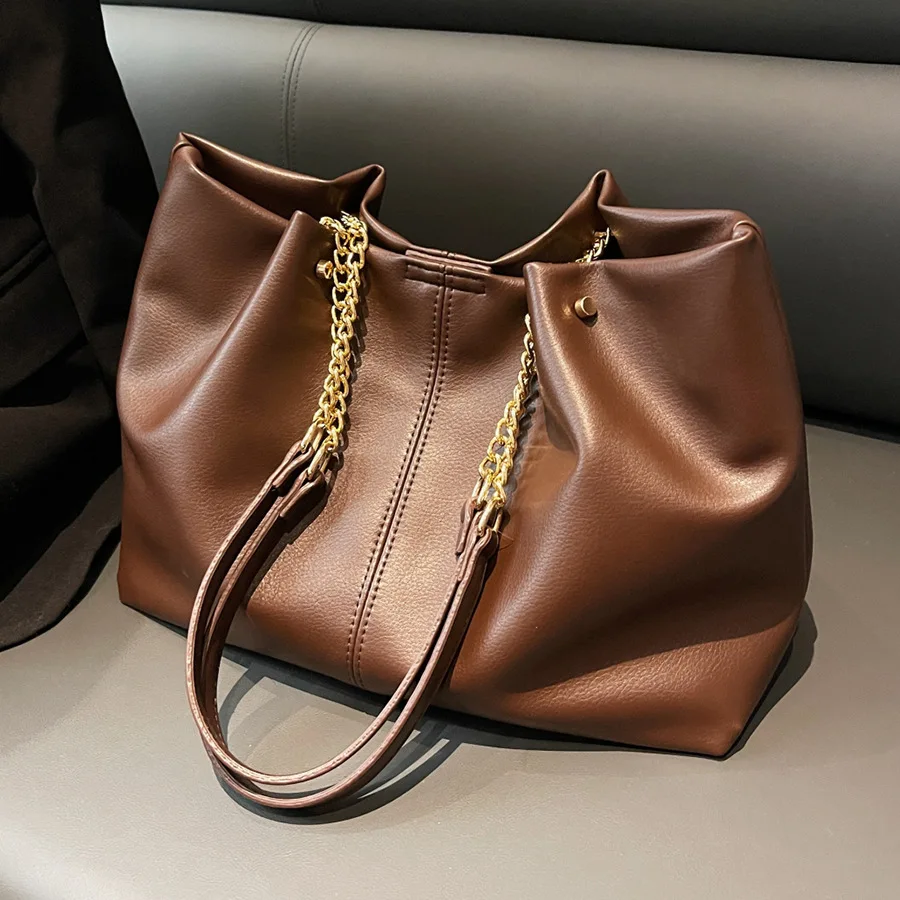 2024 new soft leather large capacity tote bag, niche high-end feeling, college student class hand-held shoulder bag сумка женска
2024 new soft leather large capacity tote bag, niche high-end feeling, college student class hand-held shoulder bag сумка женска
