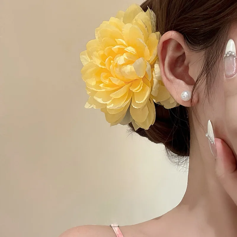 Holiday photo headgear hairpin yellow lotus flower female side chuck flower seaside hairpin hair accessories hair root
Holiday photo headgear hairpin yellow lotus flower female side chuck flower seaside hairpin hair accessories hair root