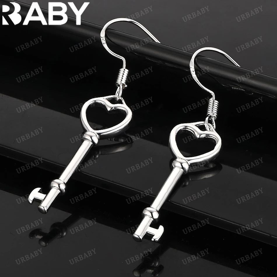 URBABY серьги-капли из стерлингового серебра 925 пробы с сердечками для женщин, ювелирные изделия, модная вечеринка и повседневная одежда
URBABY серьги-капли из стерлингового серебра 925 пробы с сердечками для женщин, ювелирные изделия, модная вечеринка и повседневная одежда