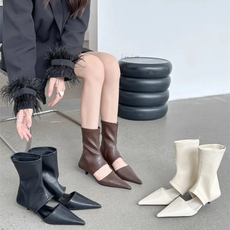 New Black Pointed Hollowed Out Cool Boots High Heel Shoes Sleeve Elastic Women's Boots Dress Shoes Stiletto Fashion Shoes Mujer
New Black Pointed Hollowed Out Cool Boots High Heel Shoes Sleeve Elastic Women's Boots Dress Shoes Stiletto Fashion Shoes Mujer