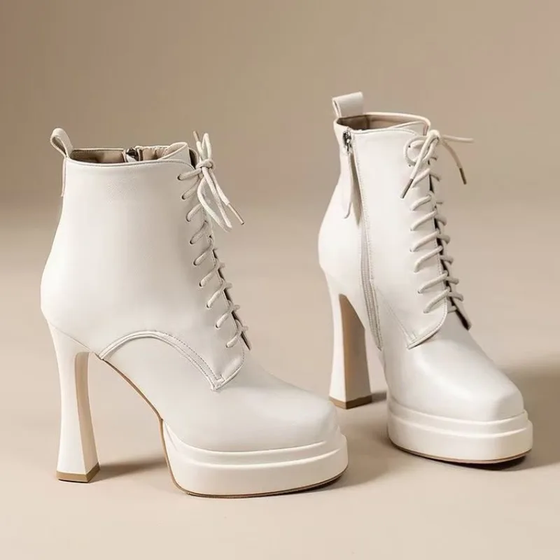 Women Punk Style Lace-Up Ankle Boots Belt Buckle Platform High Heels Short Boot Female White Autumn Winter Round Toe Shoes 2025
Women Punk Style Lace-Up Ankle Boots Belt Buckle Platform High Heels Short Boot Female White Autumn Winter Round Toe Shoes 2025