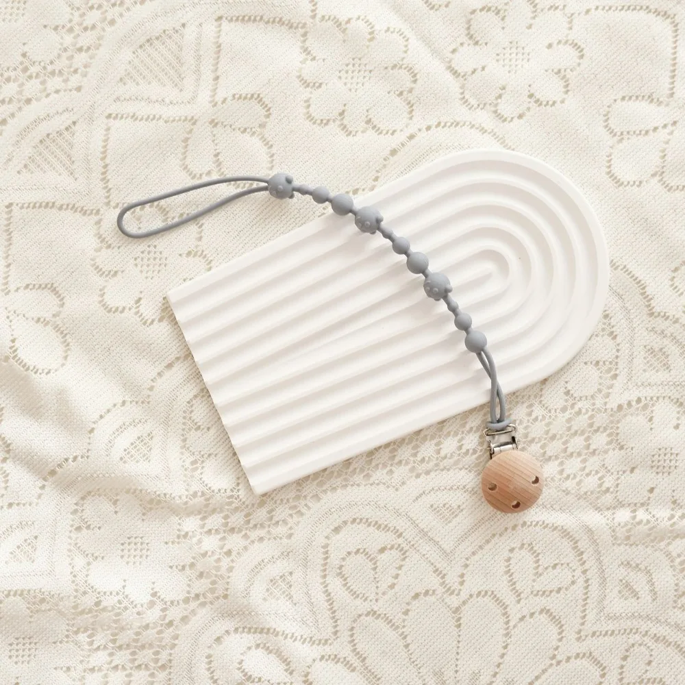 Food Grade Silicone Pacifier Clips Anti-drop Lightweight Teether Teething Toy Durable Integrated Pacifier Holder Chain Gift
Food Grade Silicone Pacifier Clips Anti-drop Lightweight Teether Teething Toy Durable Integrated Pacifier Holder Chain Gift