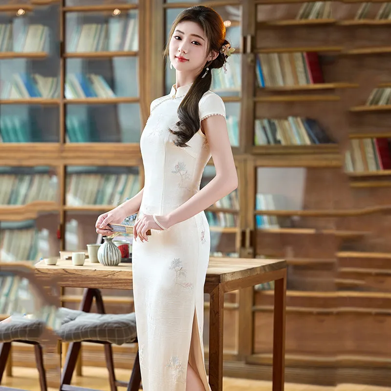 White Sleeveless Chinese Style Suzhou Long Cheongsam Improved Young Style 2026 New Female Dress Summer Qipao
White Sleeveless Chinese Style Suzhou Long Cheongsam Improved Young Style 2026 New Female Dress Summer Qipao