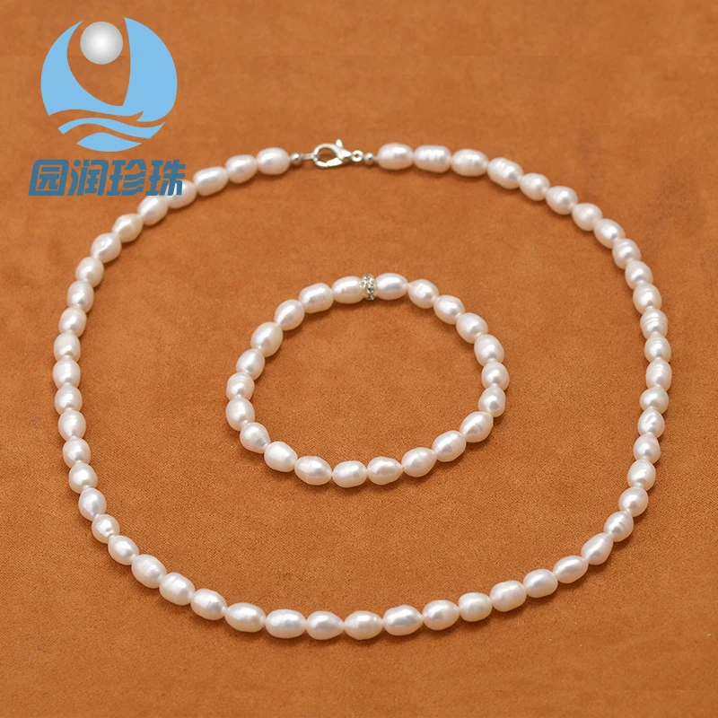 6-7mm rice-shaped natural freshwater pearl necklace and bracelet set ladies
6-7mm rice-shaped natural freshwater pearl necklace and bracelet set ladies
