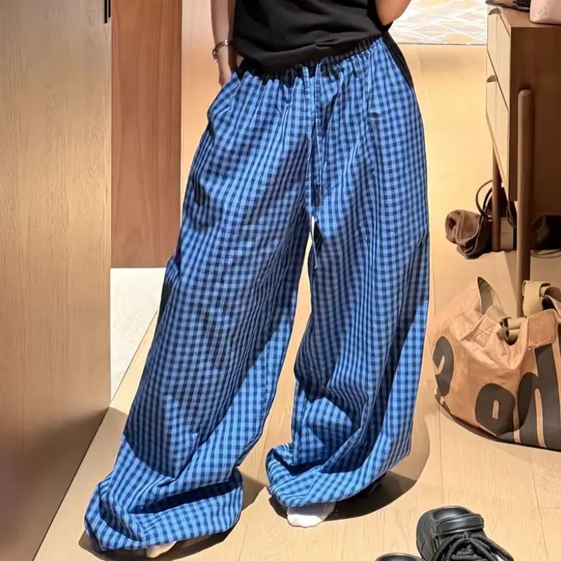 Y2K Blue Gingham Plaid High Waist Wide Leg Pants Drawstring Waist Baggy Palazzo Trousers | Lightweight Summer Casual Streetwear
Y2K Blue Gingham Plaid High Waist Wide Leg Pants Drawstring Waist Baggy Palazzo Trousers | Lightweight Summer Casual Streetwear