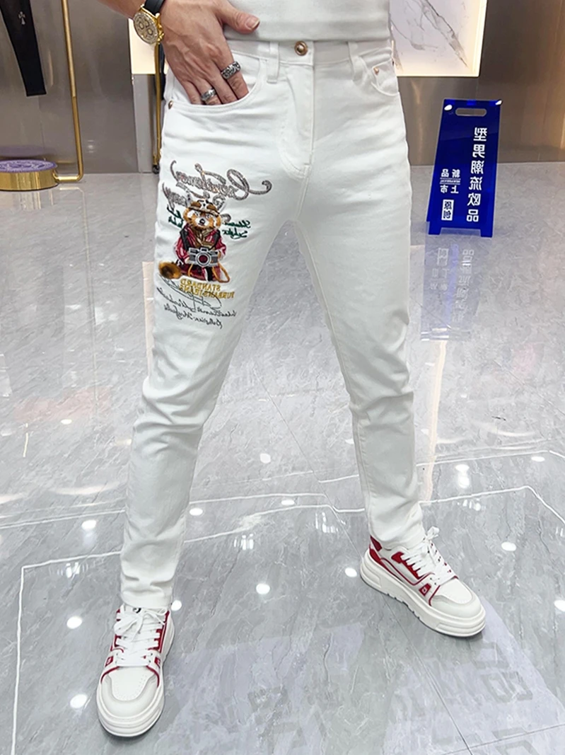White Embroidered Cartoon Slim Fit Jeans Men's Faionable Versatile Long Pants Autumn Season High Elastici Water Waed
White Embroidered Cartoon Slim Fit Jeans Men's Faionable Versatile Long Pants Autumn Season High Elastici Water Waed
