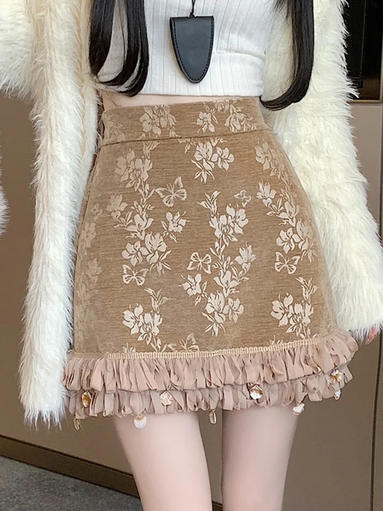 Жаккардовая юбка средней длины с вышивкой во французском стиле, утягивающая блестящая юбка трапециевидной формы с рюшами и высокой талией, модная женская короткая юбка
Жаккардовая юбка средней длины с вышивкой во французском стиле, утягивающая блестящая юбка трапециевидной формы с рюшами и высокой талией, модная женская короткая юбка