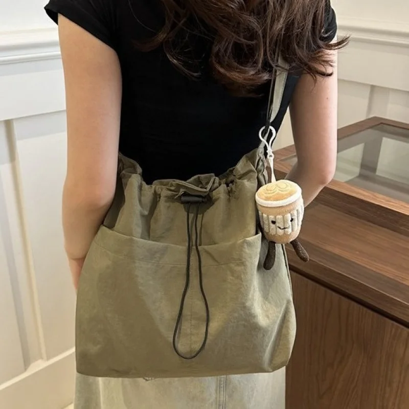 Large Capacity Women Drawstring Tote Bag Japanese Ins Style Casual Crossbody Shoulder Bag for Daily Commute Shopping
Large Capacity Women Drawstring Tote Bag Japanese Ins Style Casual Crossbody Shoulder Bag for Daily Commute Shopping