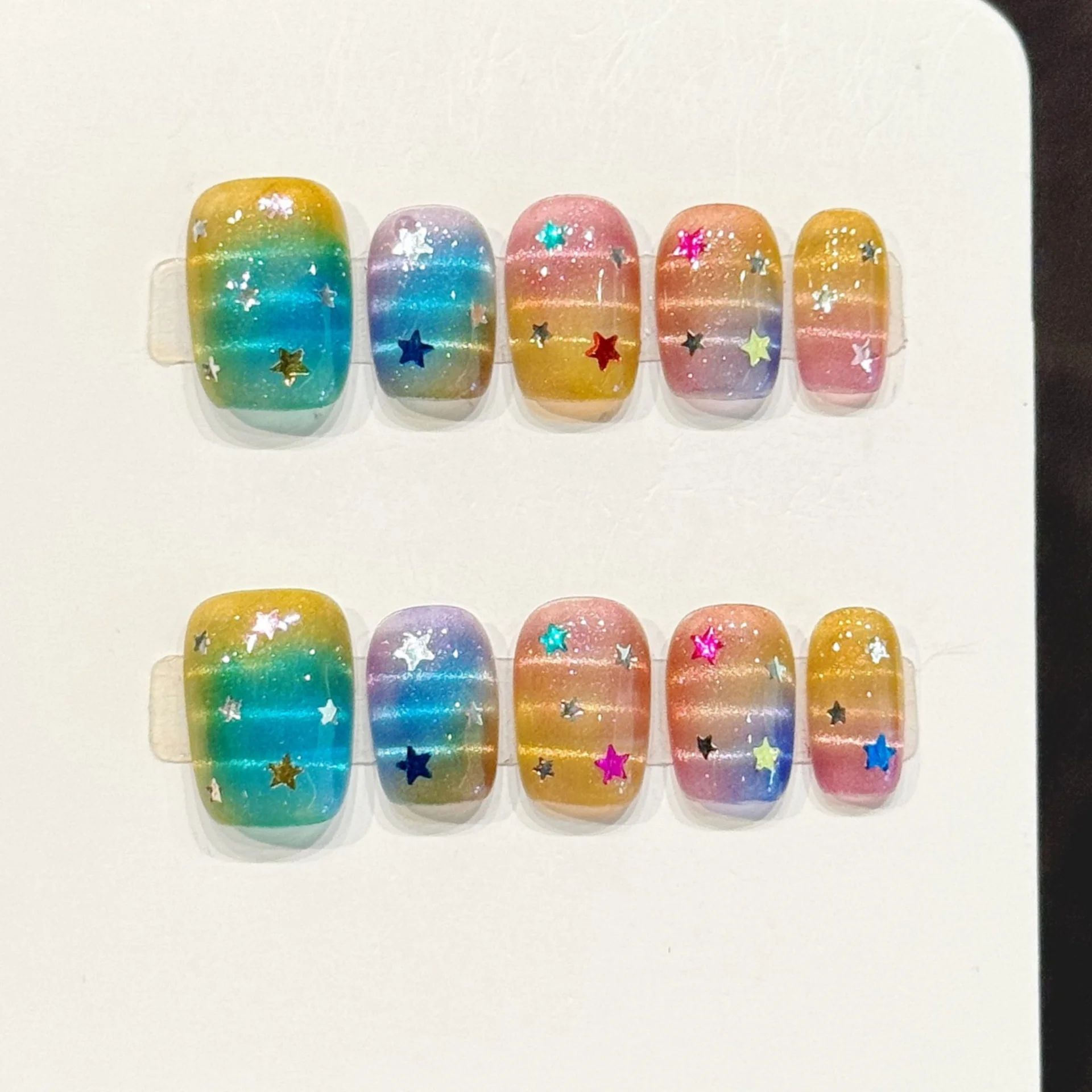 10pcs Gradient Colorful Handmade False Nails Art with Glitter Star Design Fake Nail Tips Short Ballet Press on Nails Finished
10pcs Gradient Colorful Handmade False Nails Art with Glitter Star Design Fake Nail Tips Short Ballet Press on Nails Finished