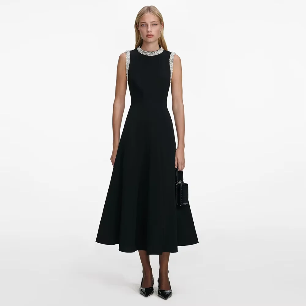 Customized Women's Party Dresses Black A Line Tea Length Pearls O Neck Party Gowns Midi Sleeveless Wedding Cocktail Dress 2026
Customized Women's Party Dresses Black A Line Tea Length Pearls O Neck Party Gowns Midi Sleeveless Wedding Cocktail Dress 2026