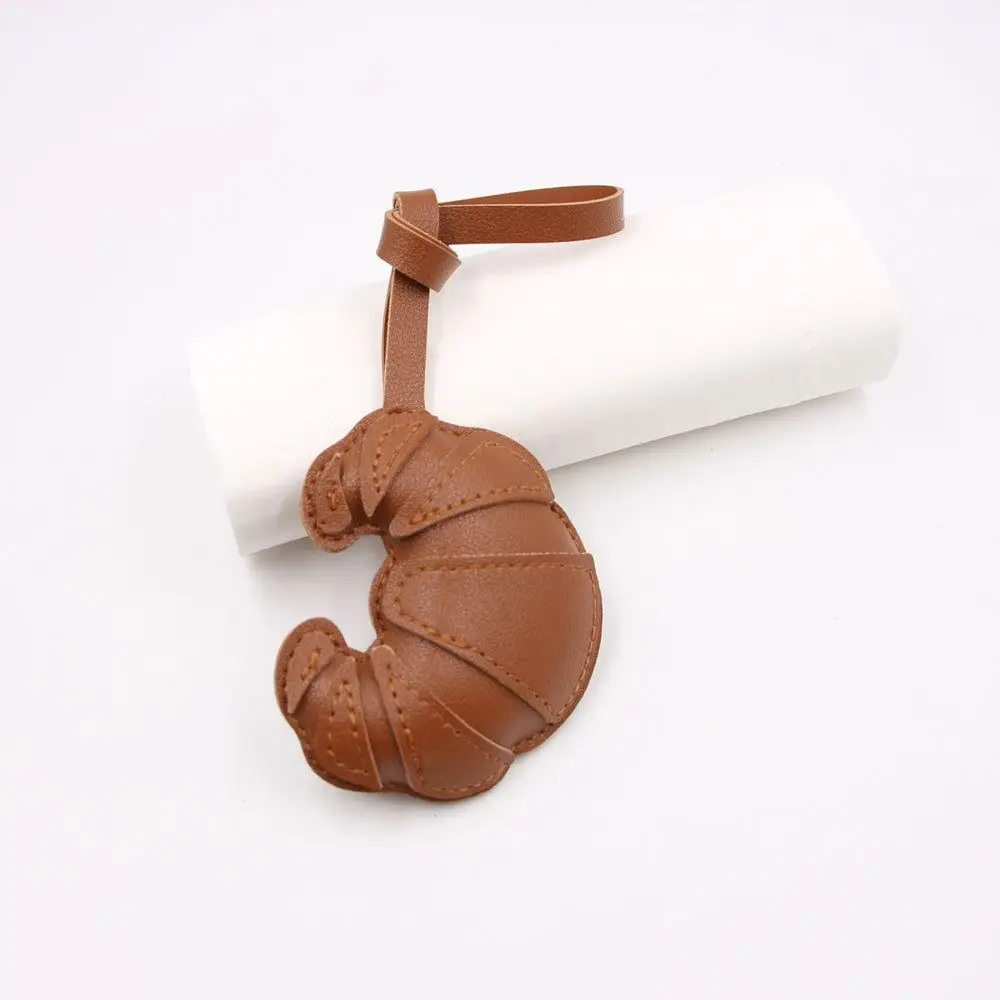 Cute PU Leather Croissant Keychain Cartoon Fashion PU Leather Hanger Car Keyring Bag Pendant Women
Cute PU Leather Croissant Keychain Cartoon Fashion PU Leather Hanger Car Keyring Bag Pendant Women
