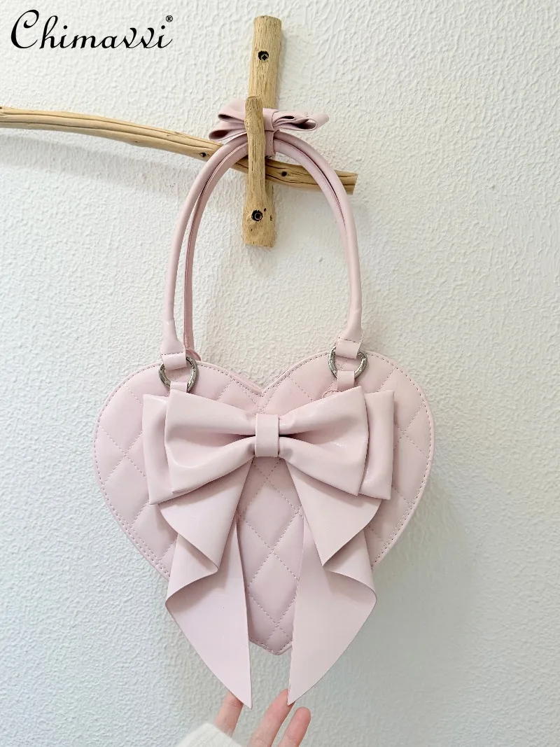 Original Japanese Sweet Lolita Bowknot Heart Handbag 2026 New Cute Girls Princess Style Versatile Y2k Women's Bags
Original Japanese Sweet Lolita Bowknot Heart Handbag 2026 New Cute Girls Princess Style Versatile Y2k Women's Bags