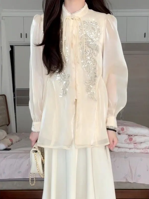New Chinese Style Super Fairy Stand Collar Tie Dotted Chiffon Shirt Women Summer 2025 Fashion Heavy Embellishment Design Sens...
New Chinese Style Super Fairy Stand Collar Tie Dotted Chiffon Shirt Women Summer 2025 Fashion Heavy Embellishment Design Sens...