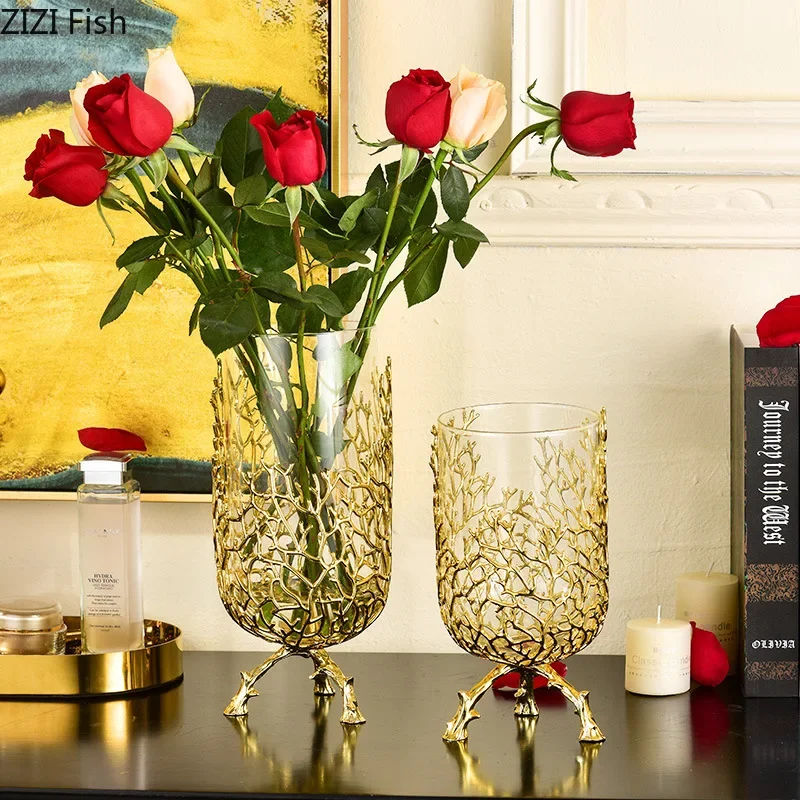 Creative glass vase Golden bracket Branches Hollow high feet Transparent hydroponic flower arrangement Metal crafts Flower vase
Creative glass vase Golden bracket Branches Hollow high feet Transparent hydroponic flower arrangement Metal crafts Flower vase
