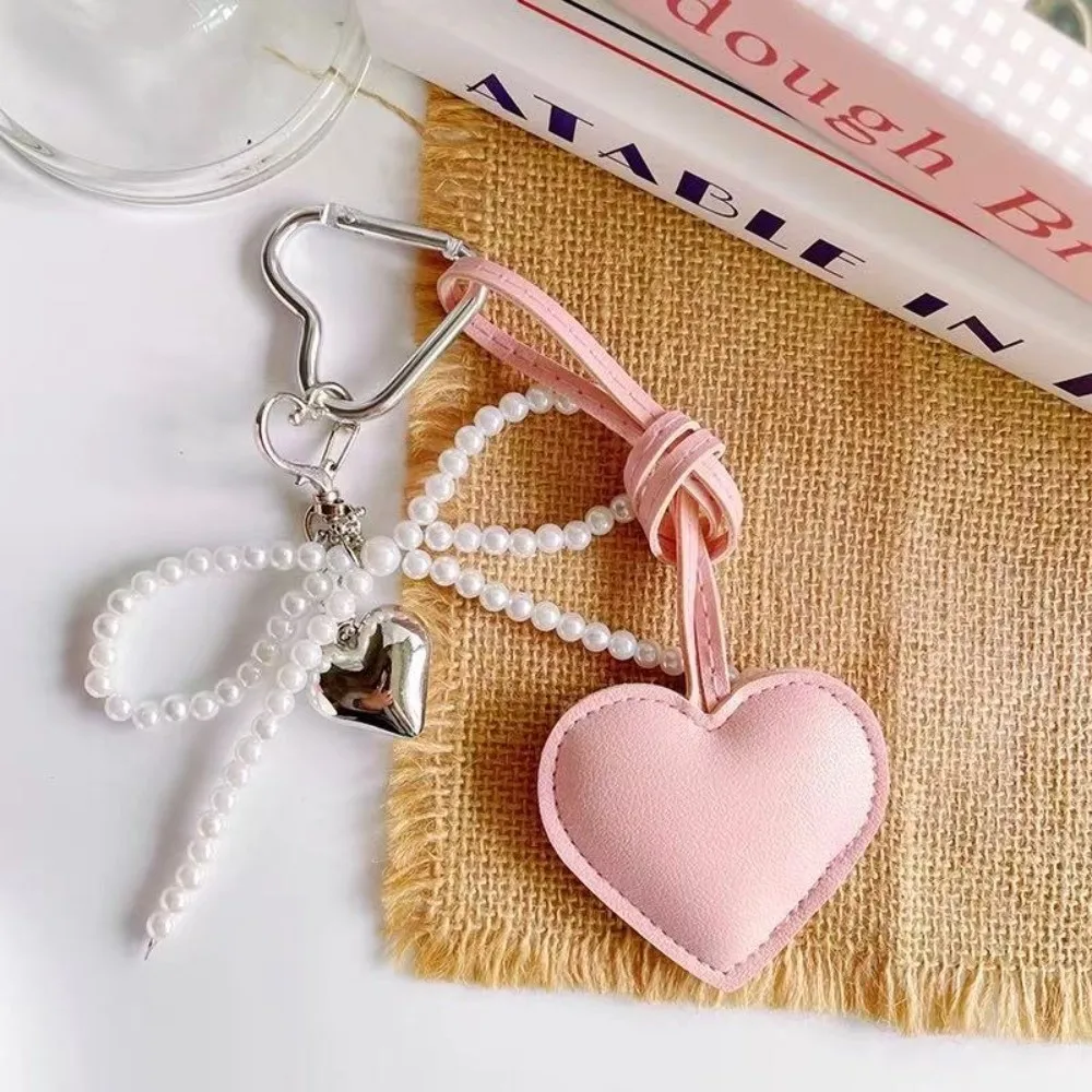Fashion PU Bow Heart Long Tassel Glossy Leather Tassel Love Heart Pendant Pearl Bow Keyring Bag Charm Accessories
Fashion PU Bow Heart Long Tassel Glossy Leather Tassel Love Heart Pendant Pearl Bow Keyring Bag Charm Accessories