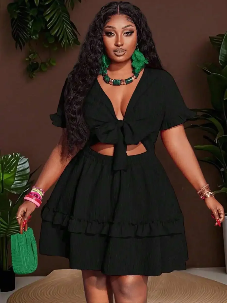 Black Solid Ruffle Mini Dress With Chest Tie-Up And Cut-Out Waist For Casual Holiday Wear
Black Solid Ruffle Mini Dress With Chest Tie-Up And Cut-Out Waist For Casual Holiday Wear
