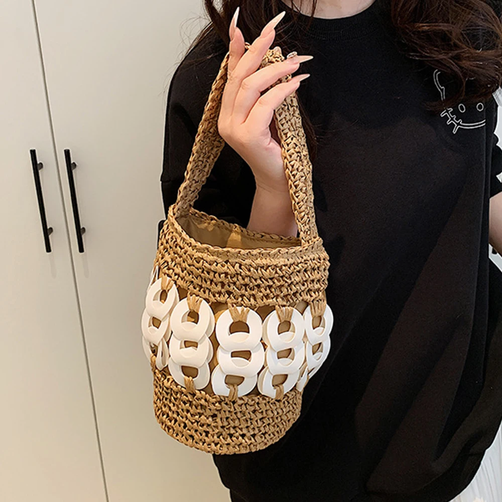 Летние тканые соломенные сумки-ведра для женщин, полые вязаные крючком пляжные сумки, богемная мини-сумка-корзина, бумажные вязаные сумки на плечо 
Летние тканые соломенные сумки-ведра для женщин, полые вязаные крючком пляжные сумки, богемная мини-сумка-корзина, бумажные вязаные сумки на плечо
