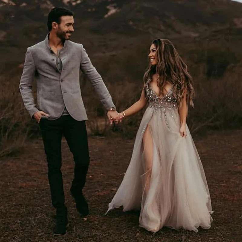Sexy Glitter Side Slit Wedding Dresses Deep V-Neck Sleeveless Bling Sequins Boho Bridal Gowns A-Line Tulle Bride Dress
Sexy Glitter Side Slit Wedding Dresses Deep V-Neck Sleeveless Bling Sequins Boho Bridal Gowns A-Line Tulle Bride Dress