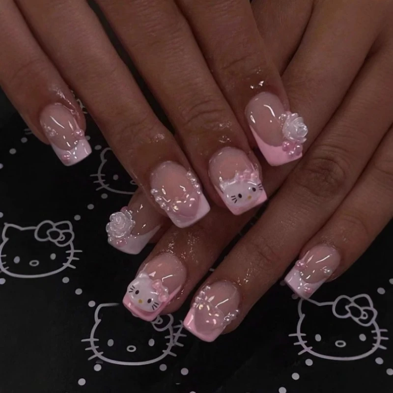 24Pcs Short Square Nails Press Ons Sanrio French Tips with Cute HelloKitty 3D Flowers Acrylic False Nail Set for Women and Girls
24Pcs Short Square Nails Press Ons Sanrio French Tips with Cute HelloKitty 3D Flowers Acrylic False Nail Set for Women and Girls
