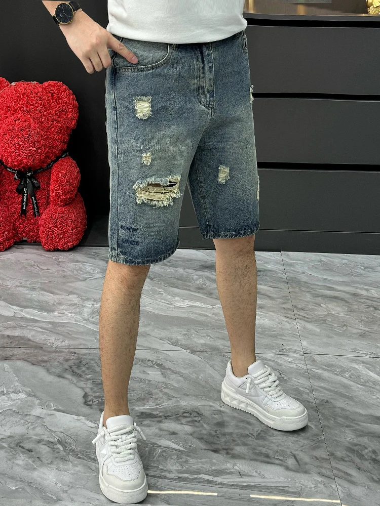 Ретро-американские уличные мужские джинсовые шорты, летние модные прямые брюки-бермуды, молодежные стильные рваные шорты
Ретро-американские уличные мужские джинсовые шорты, летние модные прямые брюки-бермуды, молодежные стильные рваные шорты