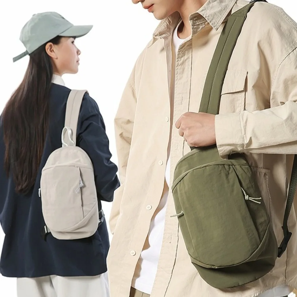 Сплошная цветная мужская нагрудная сумка, многофункциональная нейлоновая сумка большой емкости, регулируемая сумка через плечо в корейском стиле
Сплошная цветная мужская нагрудная сумка, многофункциональная нейлоновая сумка большой емкости, регулируемая сумка через плечо в корейском стиле