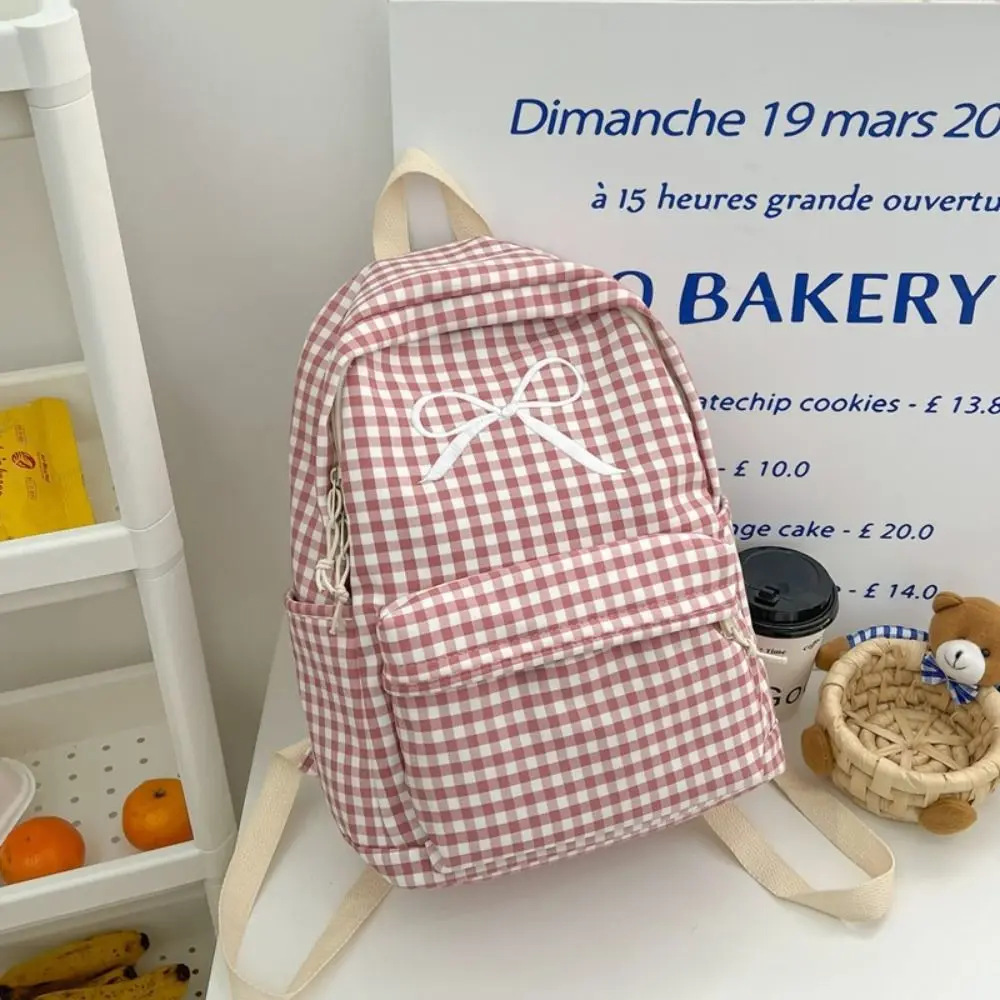 Sweet Nylon Student School Bag Large Capacity Solid Color Casual Shoulder Backpack Lattice Bow Korean Style School Bag Children
Sweet Nylon Student School Bag Large Capacity Solid Color Casual Shoulder Backpack Lattice Bow Korean Style School Bag Children