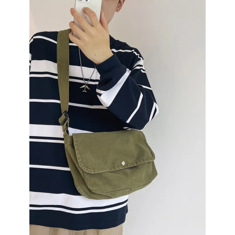 Solid color canvas bag, trendy new crossbody bag for women, brown Korean-style versatile shoulder bag, men's bag, Hong Kong styl
Solid color canvas bag, trendy new crossbody bag for women, brown Korean-style versatile shoulder bag, men's bag, Hong Kong styl