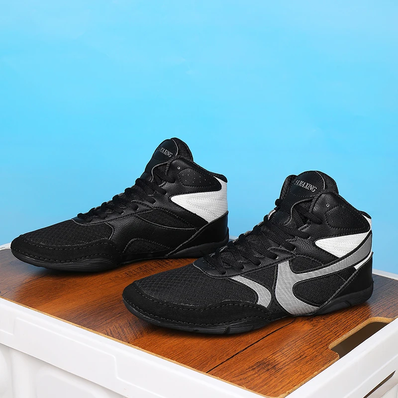 2026 New Wrestling Boots Men Black White Boxing Shoes Man Brand Designer Fighting Shoes for Mens Anti Slip Gym Training Shoe
2026 New Wrestling Boots Men Black White Boxing Shoes Man Brand Designer Fighting Shoes for Mens Anti Slip Gym Training Shoe