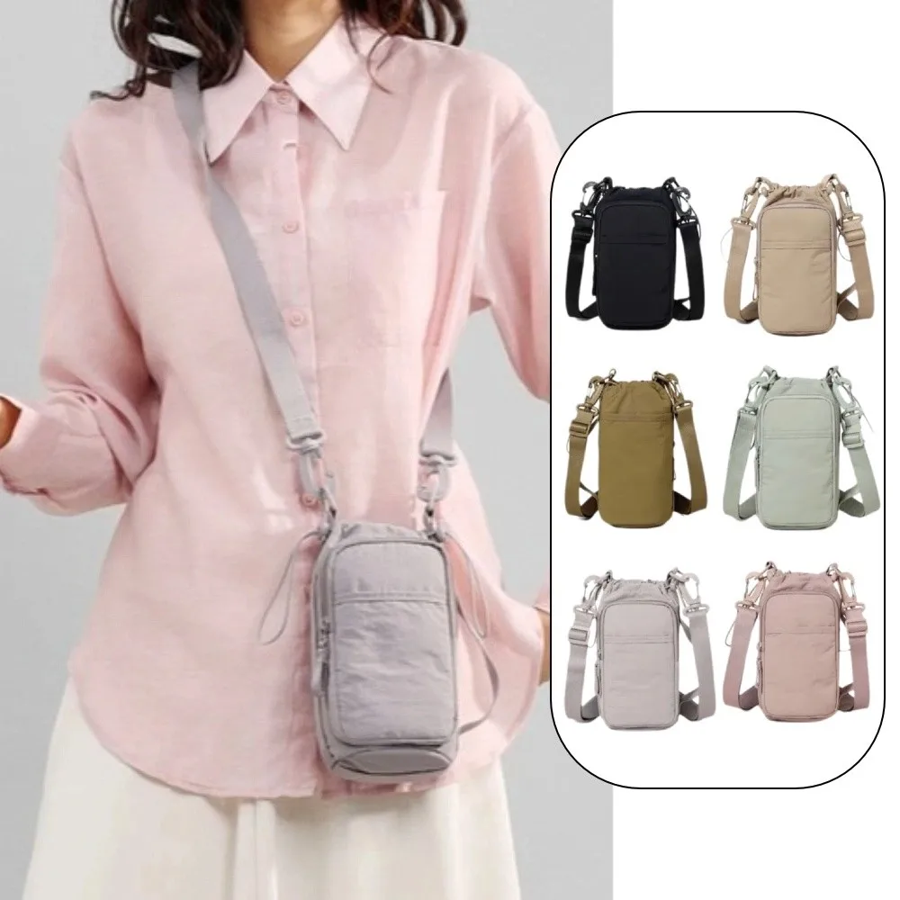Multifunctional Crossbody Phone Pouch Nylon Handhold Water Bottle Storage Bag Large Capacity Square Women's Fitness Bag Gym
Multifunctional Crossbody Phone Pouch Nylon Handhold Water Bottle Storage Bag Large Capacity Square Women's Fitness Bag Gym