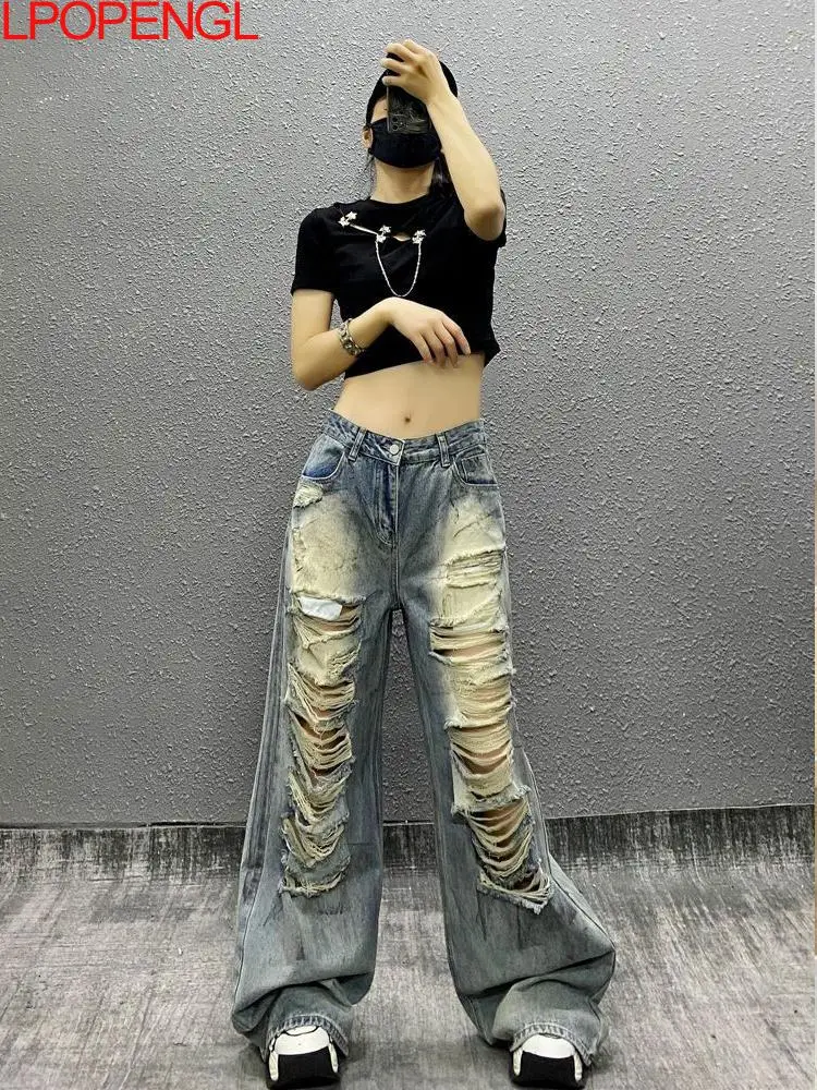 Personalized American High Street Ripped Retro Casual Jeans 2026 Women's Summer New High Waisted Loose Versatile Straight Pants
Personalized American High Street Ripped Retro Casual Jeans 2026 Women's Summer New High Waisted Loose Versatile Straight Pants