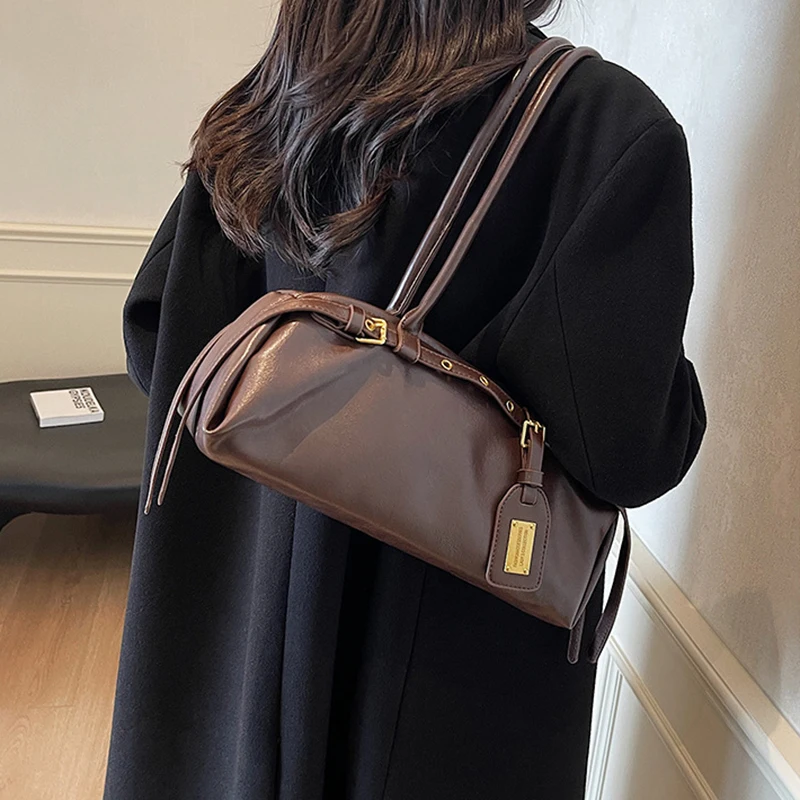 Zhongguo Underarm Bag Autumn And Winter New Niche Design Bowling Bag PU Leather Large Capacity Retro Fashion Shoulder Bag
Zhongguo Underarm Bag Autumn And Winter New Niche Design Bowling Bag PU Leather Large Capacity Retro Fashion Shoulder Bag