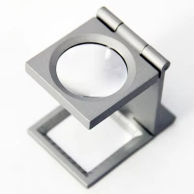 Triple fold portable metal optical lens Magnifier 10x 12x textile printing with scale black gray plane
Triple fold portable metal optical lens Magnifier 10x 12x textile printing with scale black gray plane