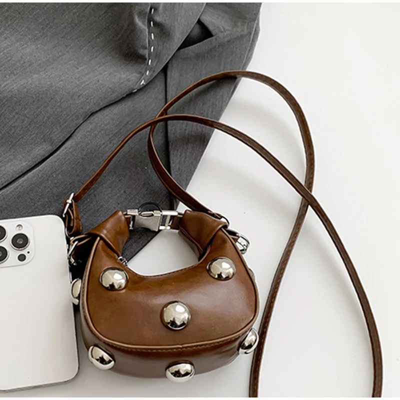 Korean Fashion Rivet Ladies Crossbody Bag Mini Dumpling Bag 2025 New Simple Solid Color Handbag Girl Small Exquisite Coin Purse
Korean Fashion Rivet Ladies Crossbody Bag Mini Dumpling Bag 2025 New Simple Solid Color Handbag Girl Small Exquisite Coin Purse