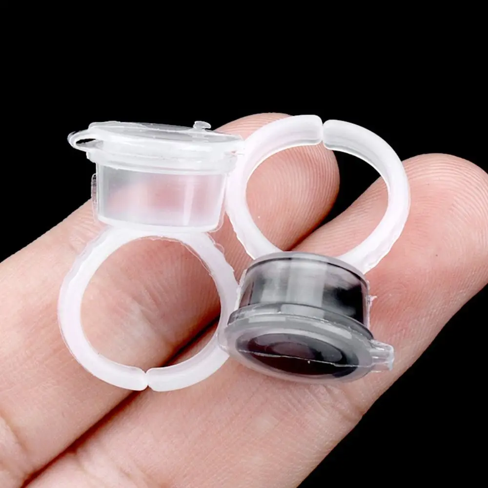 50PCS Plastic Tattoo Ink Ring Cups With Lid Multifunctional Microblading Pigment Cup Eyelash Extension Glue Tray Tool
50PCS Plastic Tattoo Ink Ring Cups With Lid Multifunctional Microblading Pigment Cup Eyelash Extension Glue Tray Tool