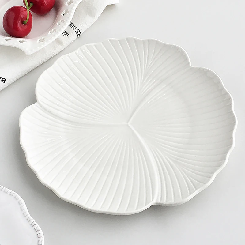 Flower Ceramic Plate Fashion Household Dessert Flat Plates Irregular Simple White Serving Dish Restaurant Fruit Salad Soup Plate
Flower Ceramic Plate Fashion Household Dessert Flat Plates Irregular Simple White Serving Dish Restaurant Fruit Salad Soup Plate