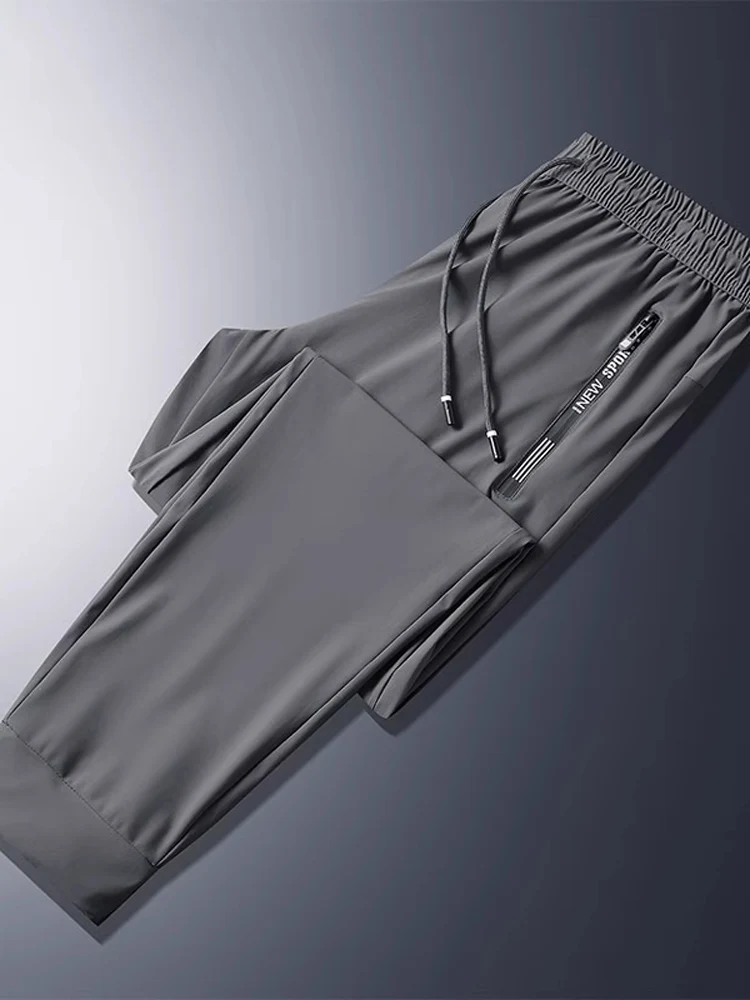 High Elastici Ice Silk Men's Summer Casual Pants Thin Qui Dry Sports Long Trousers Faionable New Sle Loose Fit Polyes...
High Elastici Ice Silk Men's Summer Casual Pants Thin Qui Dry Sports Long Trousers Faionable New Sle Loose Fit Polyes...