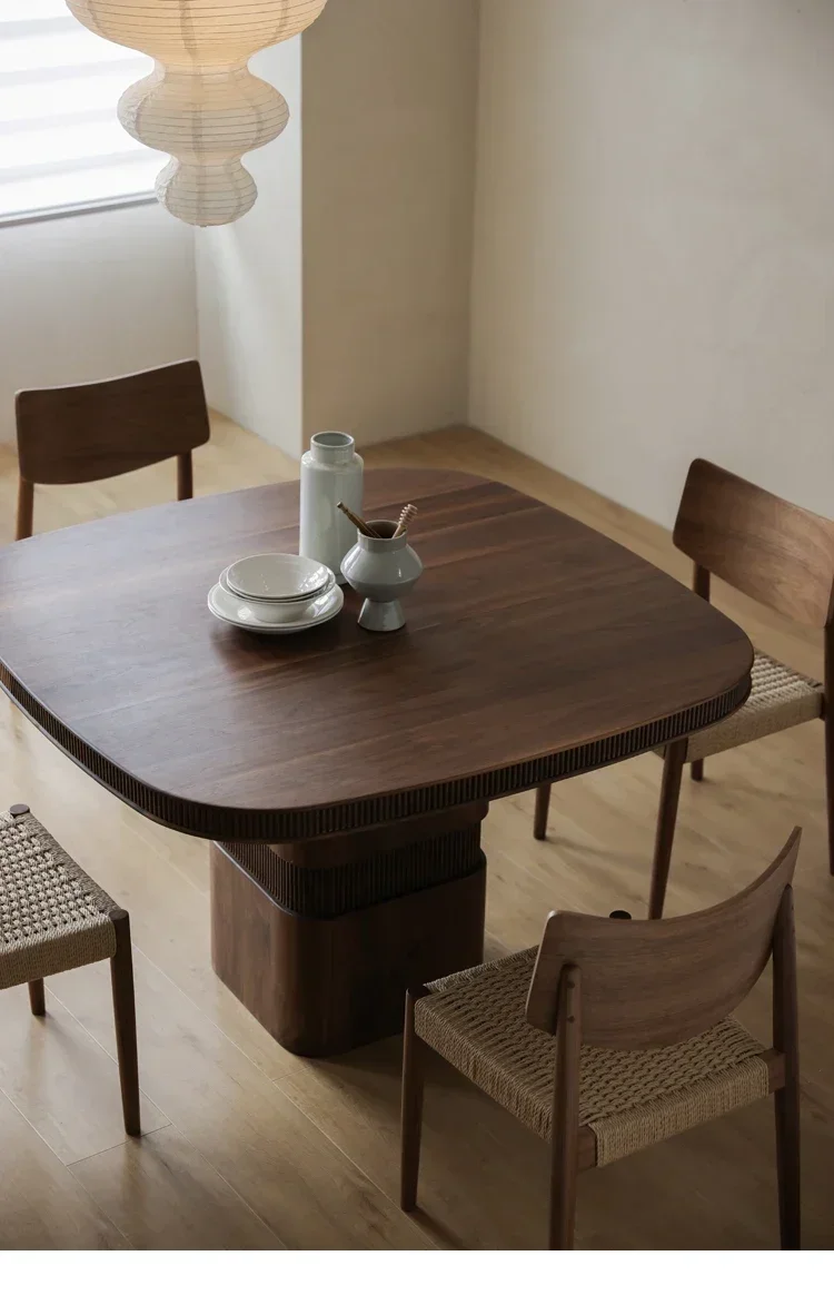 Medieval black walnut square rounded corner dining table pure solid wood round table square table new Chinese retro
Medieval black walnut square rounded corner dining table pure solid wood round table square table new Chinese retro